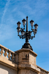 Fototapeta na wymiar Ornate Lighting on one of the bridges in Valencia in Spain