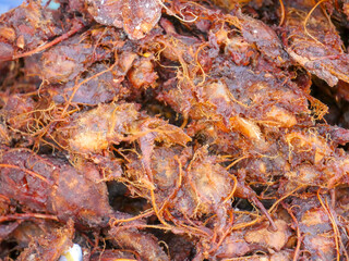 Heap of Tamarind imli selling in Indian shop as spice. Tamarind known as Imli in India is a widely used spice-condiment in India.