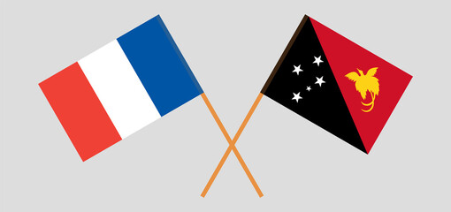 Crossed flags of France and Papua New Guinea. Official colors. Correct proportion