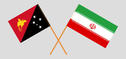 Crossed flags of Papua New Guinea and Iran. Official colors. Correct proportion