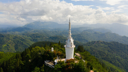 Ambuluwawa Tower is a temple of four religions in Sri Lanka. The tower rises above the jungle on a...