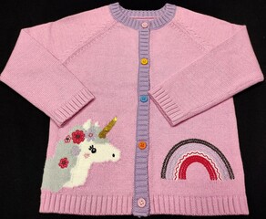 Woman knitted sweaters and embroidery designs for fall and spring season. red and white shirt.
