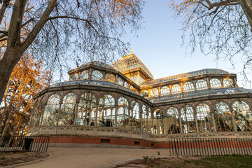 Madrid, Spain. The Palacio de Cristal del Retiro (Retreatment Park Glass or Crystal Palace), a conservatory located in Buen Retiro Park, part of Reina Sofia Museum - obrazy, fototapety, plakaty