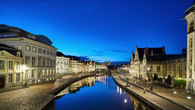 Ghent night timelapse showing the Leie (Lys) river and historic waterfront buildings. Belgium