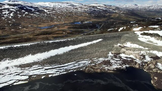 Aerial View Of Sysendammen In The Municipality of Eidfjord in Hordaland, Norway. Dolly Back, Rising Shot