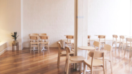 Blur or defocus white color coffee shop cafe or restaurant modern and minimal style interior with japan style. Emphy shop. use for background