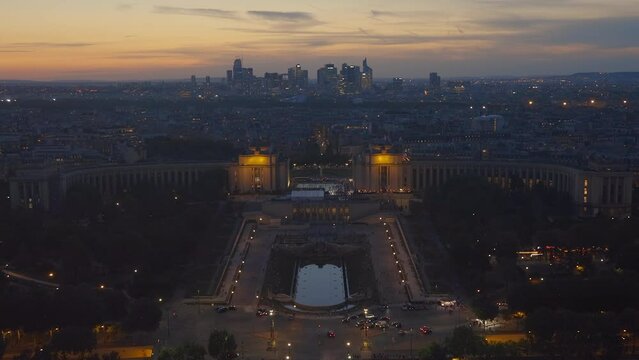 Trocadero esplanade and La Defense district seen from the Eiffel Tower on a spring evening at sunset in paris, France