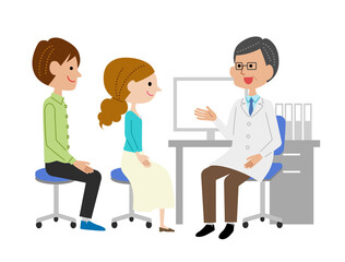 診察室で男性医師に説明を受ける若い夫婦