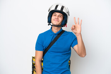 Young caucasian man with thermal backpack isolated on white background happy and counting three with fingers