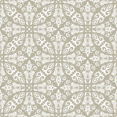 Classic seamless vector pattern. Damask orient beige and white ornament. Classic vintage background. Orient pattern for fabric, wallpapers and packaging