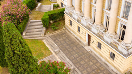 Aerial view on the stone stairs of a prestigious garden of a villa.