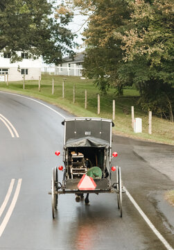 Amish buggy from behind carrying supplies | Holmes County, Ohio