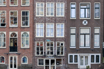 Close Up Old Historical Houses At The Canal Around Damrak Amsterdam The Netherlands