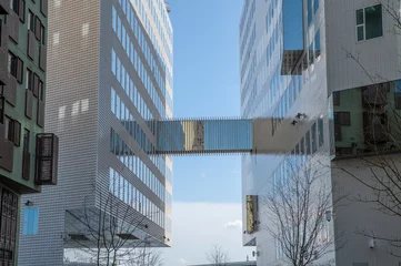 Foto op Plexiglas Close Up Overflow Bridge At Paleis Van Justitie And Openbaar Ministerie Buildings At Amsterdam The Netherlands 17-3-2022 © Robertvt