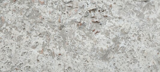 The texture of a concrete wall. A banner with a gray background. Stone abstract backdrop.