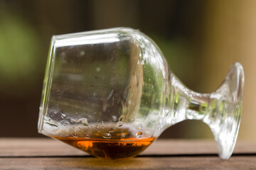 glass with a drink horizontally