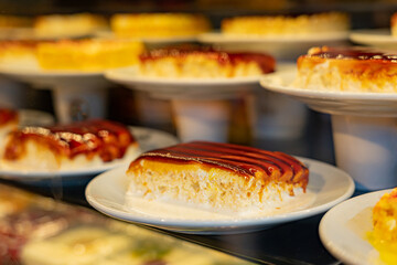  Sweet dessert 3 milk on plate behind showcase