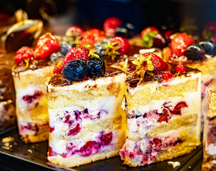 Creamy piece of strawberry cake in restaraunt