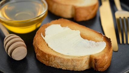 Bread and butter on breakfast, close up