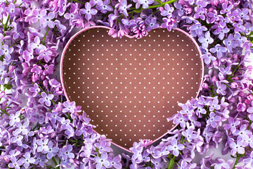 A heart-shaped lilac frame. Holiday card