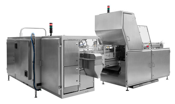 Industrial line for packaging of food products. Packing of bread at the factory.The machine for cutting and packing in a factory for the production of bread. isolated on white background
