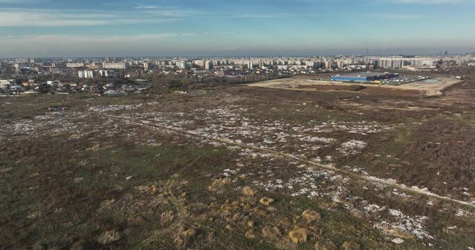 Garbage dump. City of Bucharest on hte background. Enviroment pollution concerns