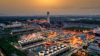 Fototapeta premium Aerial view electric plants turbine generator in the power plant, Gas turbine electrical power plant electricity generating station industry.