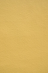 黄色いざらざらした壁の背景素材	