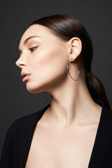 Fototapeta premium Beautiful young woman with jewelry
