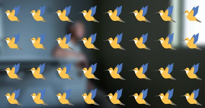 Animation of birds icons over biracial woman in bed