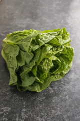 Healthy food, green leaf lettuce salad top view