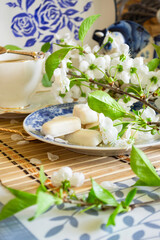 Homemade white chocolate bonbon candies. Tenderness morning coffee