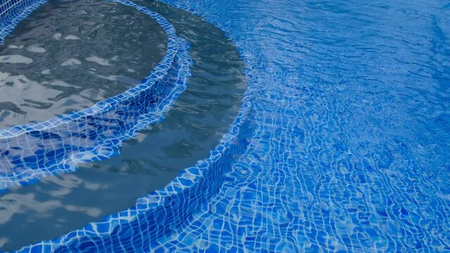 swimming pool step, view of beautiful swimming pool material detail and decoration design.
