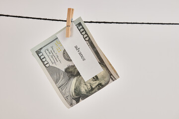 A $ 100 bill with the word 