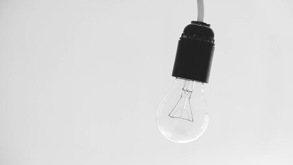 Transparent light bulb on a white background