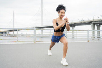Naklejka premium Sportswoman young woman training in sportswear, active exercises for health