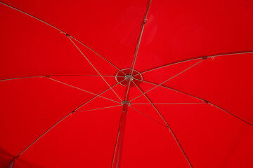 low angle close up of a large red umbrella