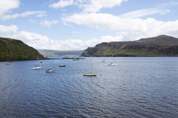 Fototapeta na wymiar Harbor at Portree on the Isle of Skye in Scotland