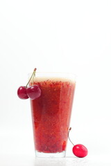 cherry drink and bunch of cherries on white background, cold drink, space for text