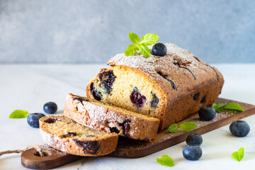 Blueberry cake on white background.