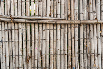 Close Up Of A Bamboo White Fence