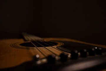 Guitar.Guitar's chords.Acoustic guitar.Music.Music background.Image of an acoustic guitar.Playing...