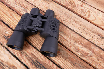Binocular on wood