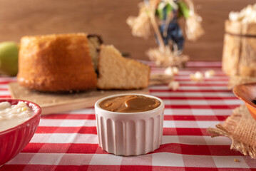 Table of brazilian festa junina. .Milk cream