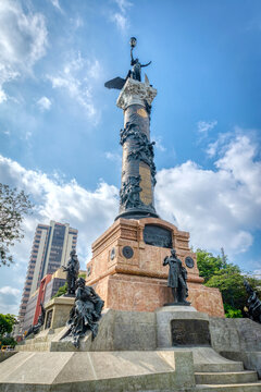 Guayaquil, Guayas, Ecuador - November, 2013: Frontal view of the Column of Heroes at the Centennial Park, on a sunny afternoon in the city.