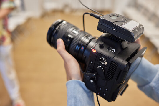 Video Making with the stabilizer. Man recording a video with a slr camcoder.