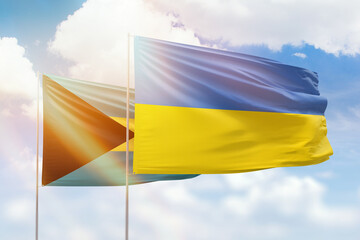 Sunny blue sky and flags of ukraine and bahamas