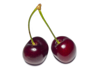 Juicy cherries   on a white background. Useful food. Beautiful berries isolate. Ripe berries on the table.