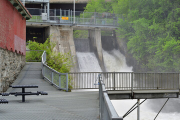 Magog river Sherbrooke Frontenac hydroelectric power plant. Picnic areas on a superb terrace...