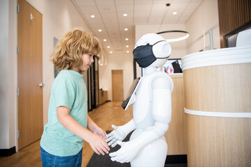 busy child interact with robot artificial intelligence, communication